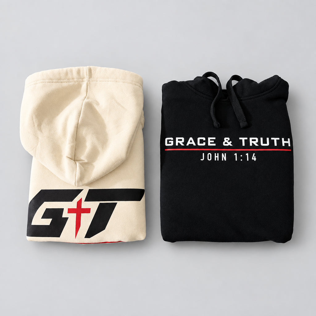 Two folded hoodies displayed side by side on a dark gray background. The left hoodie is cream with a black and red 'GT' logo.
