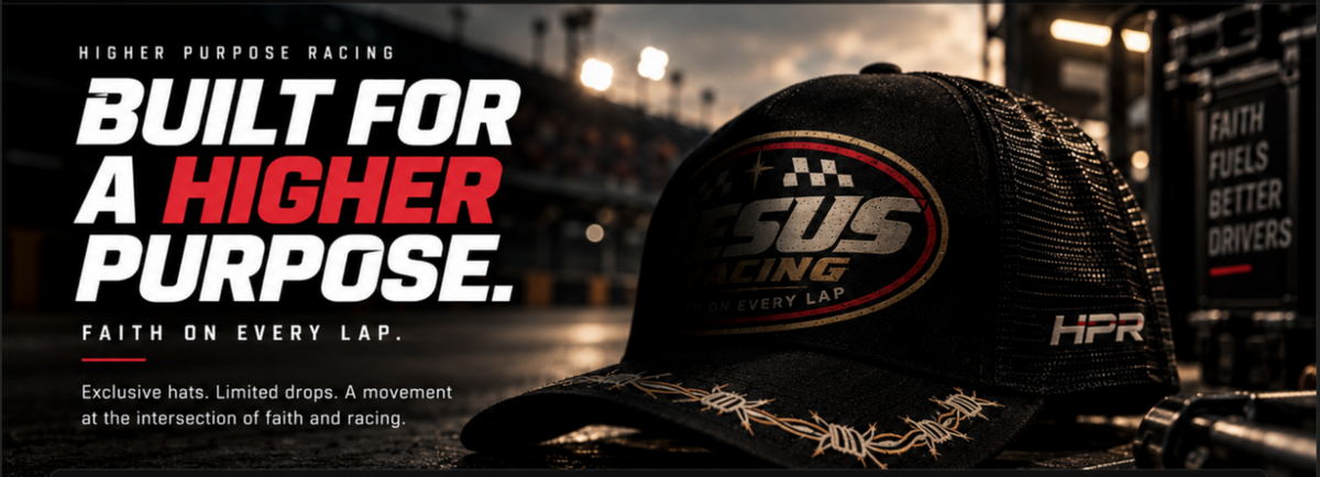A black trucker hat with a large front logo reading 'Jesus Racing' and 'HPR' on the side, shown in a dark racing-themed promotional setting with large text on the left.