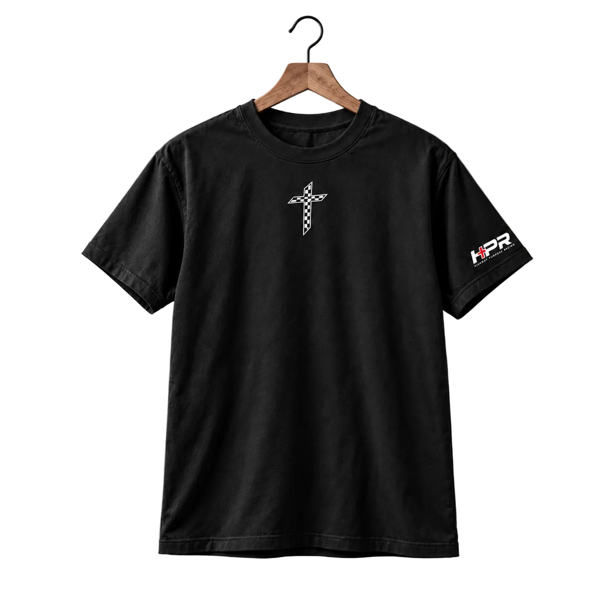 A black short-sleeve t-shirt hanging on a wooden hanger against a light gray wall. The shirt features a small white graphic of a cross made of checkered racing flags on the left chest and a white sleeve print reading 'HPR' on the right sleeve.